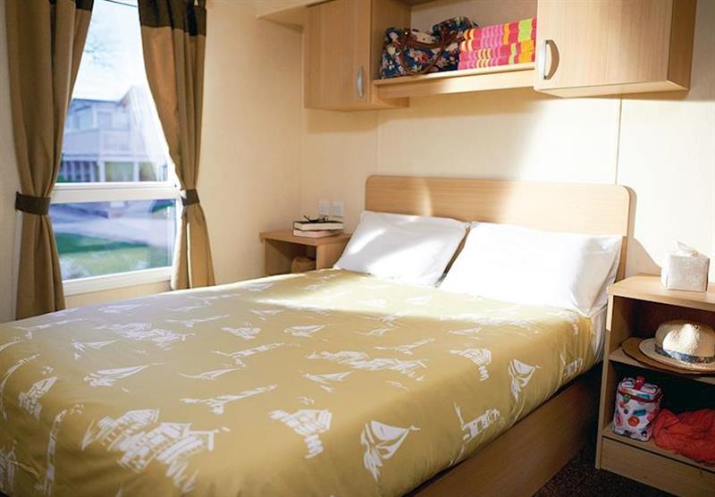 Bedroom in a Deluxe Caravan at Lydstep Beach in Pembrokeshire, South Wales