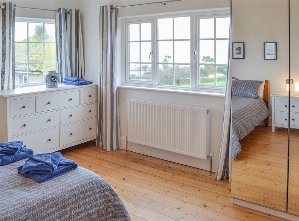 Light and airy master bedroom at Lyndale in Penzance, Cornwall