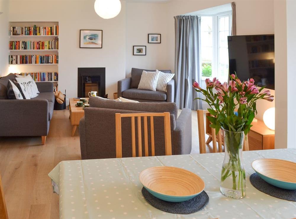 Warm and welcoming living area with woodburner at Lyndale in Penzance, Cornwall