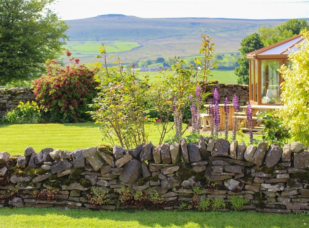Beautiful lawned garden with fantastic Dales views at Lyndhurst Cottage in Carlton-in-Coverdale, near Leyburn, North Yorkshire