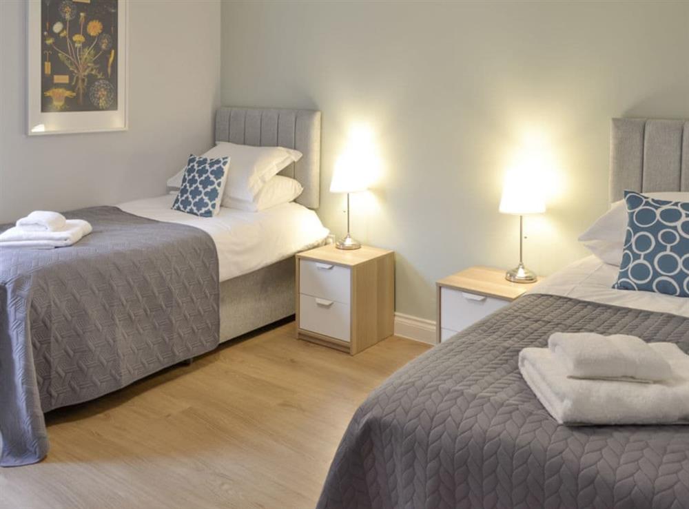 Comfortable twin bedroom at Lyndhurst in Perranporth, Cornwall