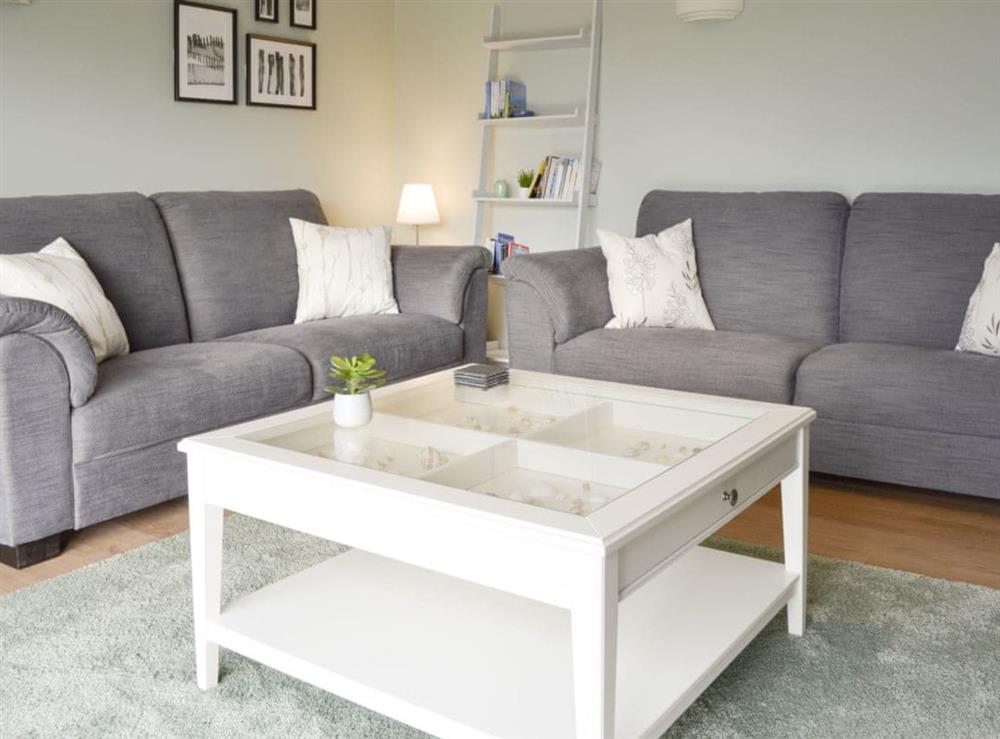 Comfy seating within ground floor living room at Lyndhurst in Perranporth, Cornwall