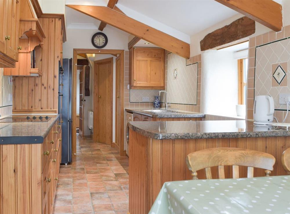 Lovely and bright kitchen with breakfast area at The Byre, 
