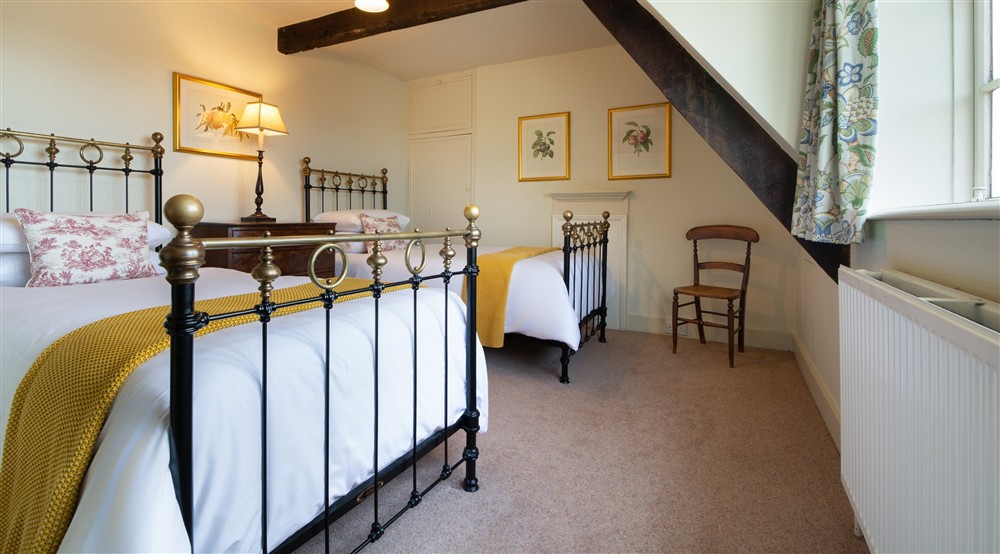 Second-floor twin bedroom at Lytes Cary in Somerton, Somerset