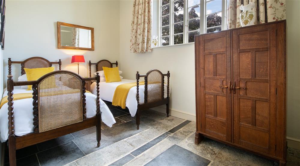 The ground floor twin bedroom at Lytes Cary in Somerton, Somerset