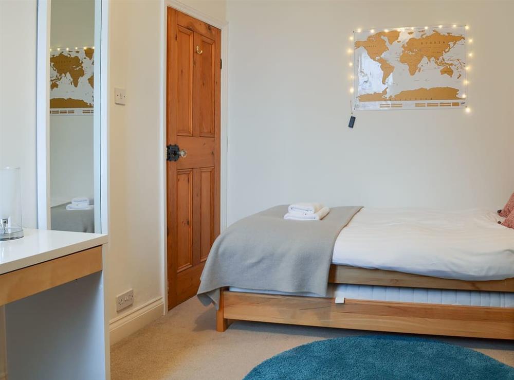Modest bedroom with single bed at Lythdene in Grange-over-Sands, Cumbria