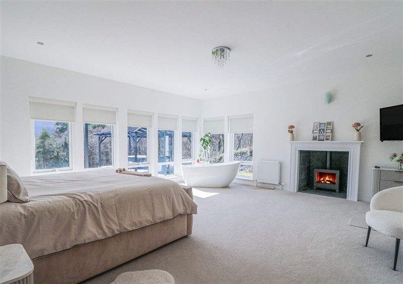A bedroom in Macgregor Ranch at Macgregor Ranch, Achnabobane near Spean Bridge