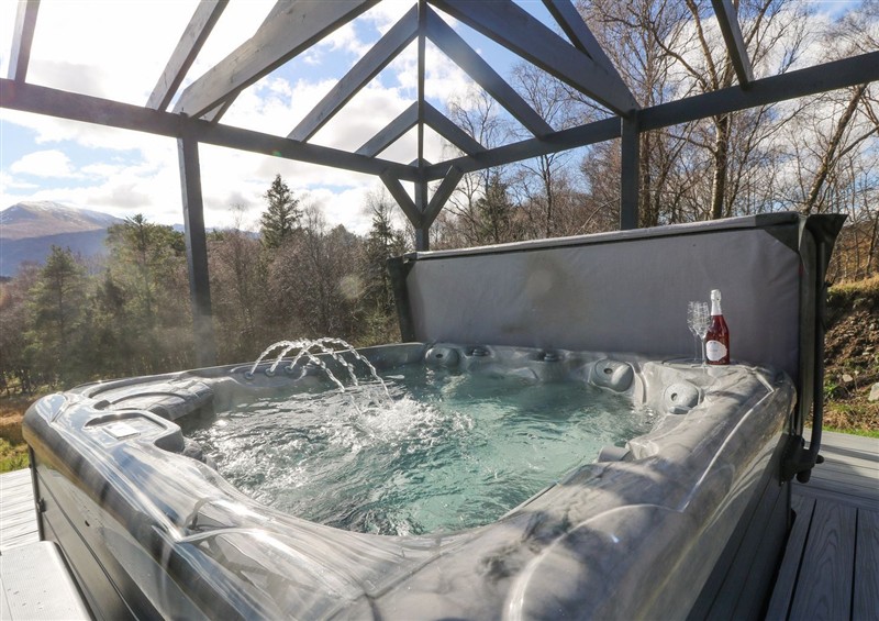 Relax in the hot tub at Macgregor Ranch, Achnabobane near Spean Bridge