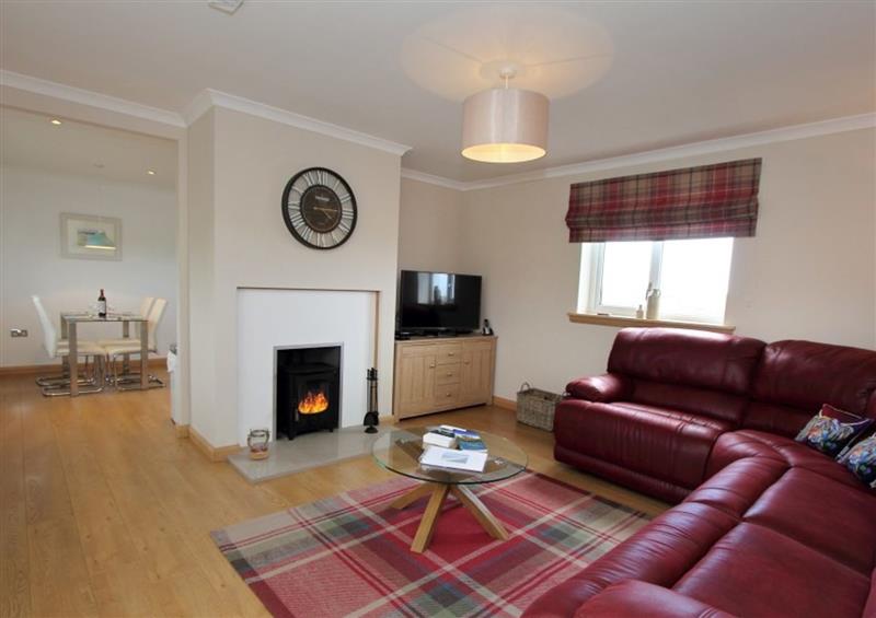 Enjoy the living room (photo 2) at Machair Cottage, Newton near Lochmaddy