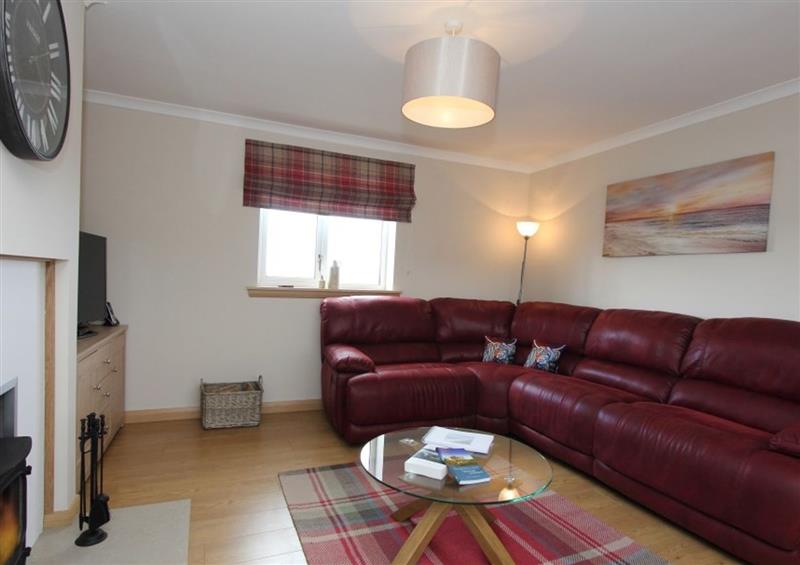 Enjoy the living room at Machair Cottage, Newton near Lochmaddy
