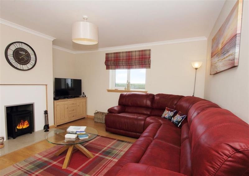 Relax in the living area at Machair Cottage, Newton near Lochmaddy
