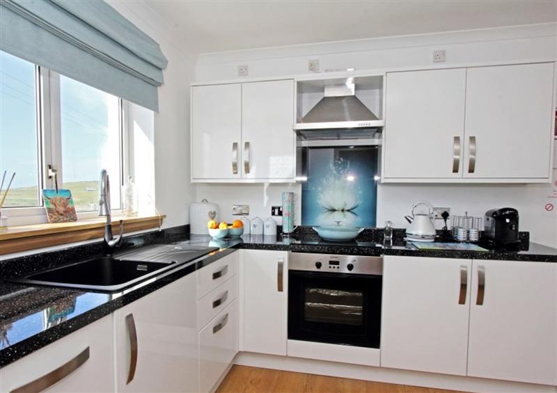 This is the kitchen (photo 2) at Machair Cottage, Newton near Lochmaddy