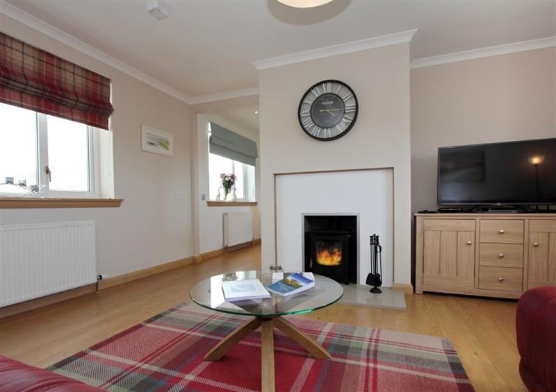 This is the living room (photo 2) at Machair Cottage, Newton near Lochmaddy