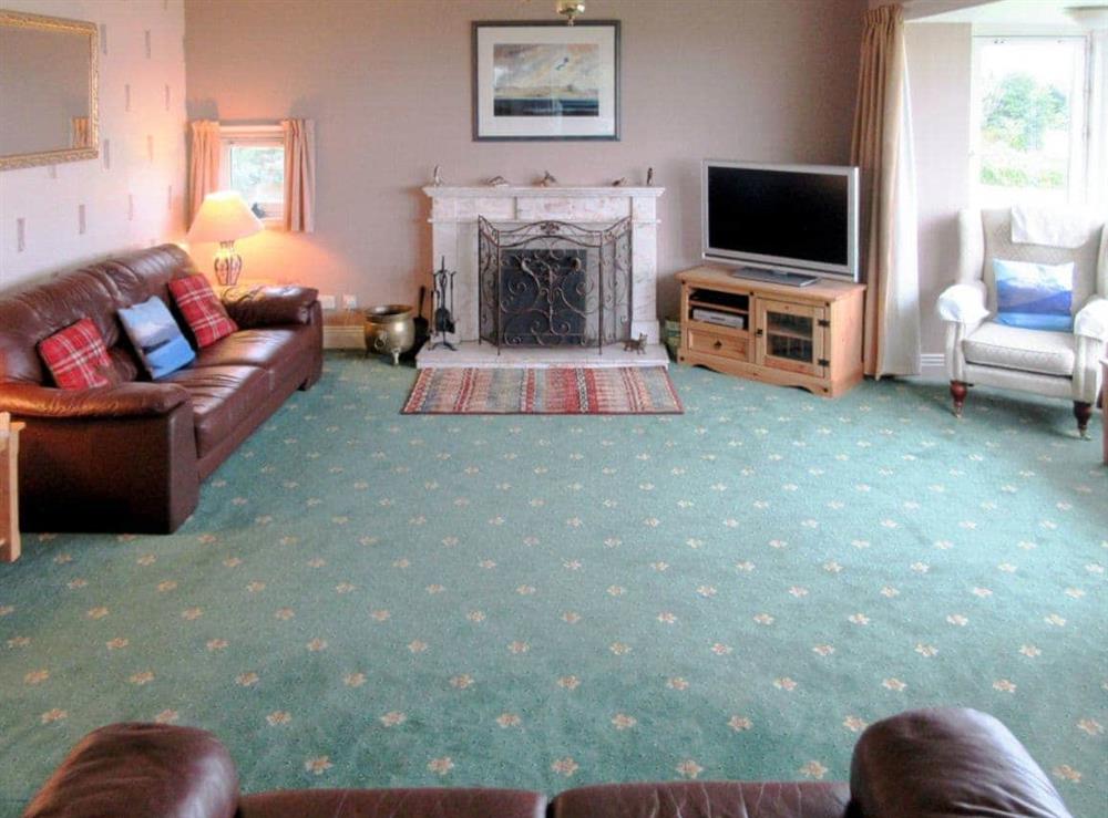 Comfortable, spacious living room at Macinnisfree Cottage in Saasaig, Teangue, Isle of Skye., Great Britain
