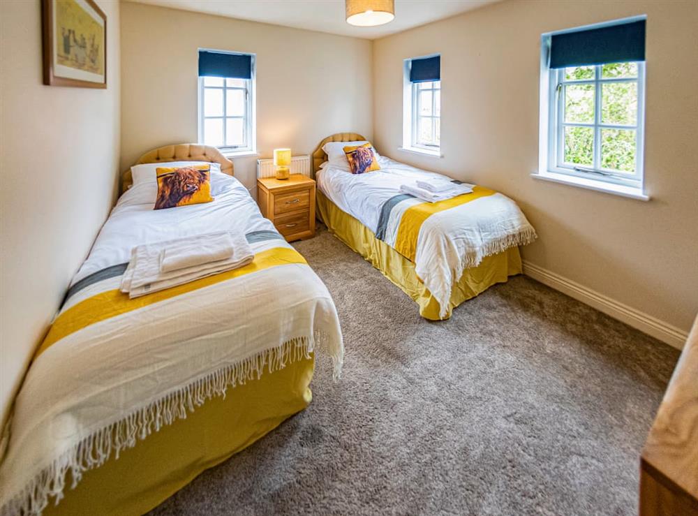 Twin bedroom at Mackintoch Cottage in Langtoft, North Humberside