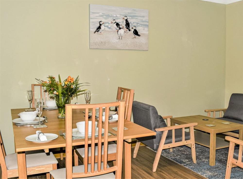 Dining Area at MacRury Cottage in Balemore, Isle Of North Uist