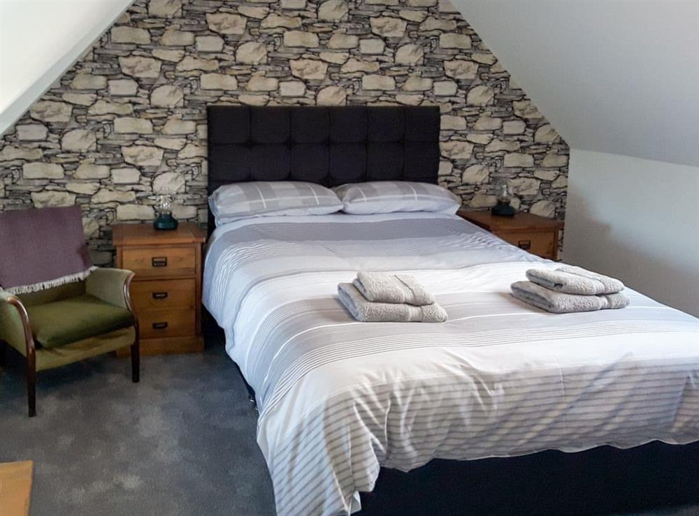 Double bedroom at MacRury Cottage in Balemore, Isle Of North Uist