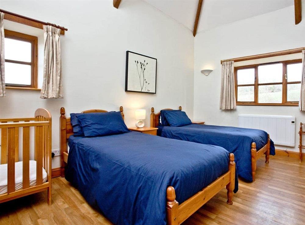 Twin bedded room with cot at Madeleine in Ashcombe, Nr Dawlish, South Devon., Great Britain