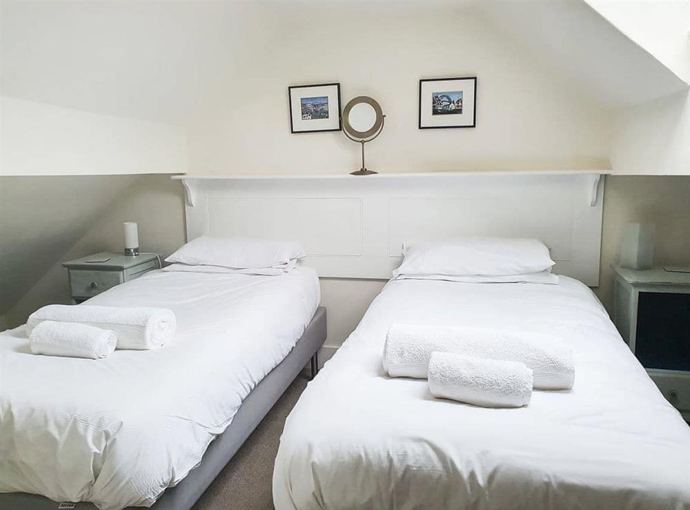 Cosy twin bedroom at Madeleine’s Barn in Wells-next-the-Sea, Norfolk., Great Britain