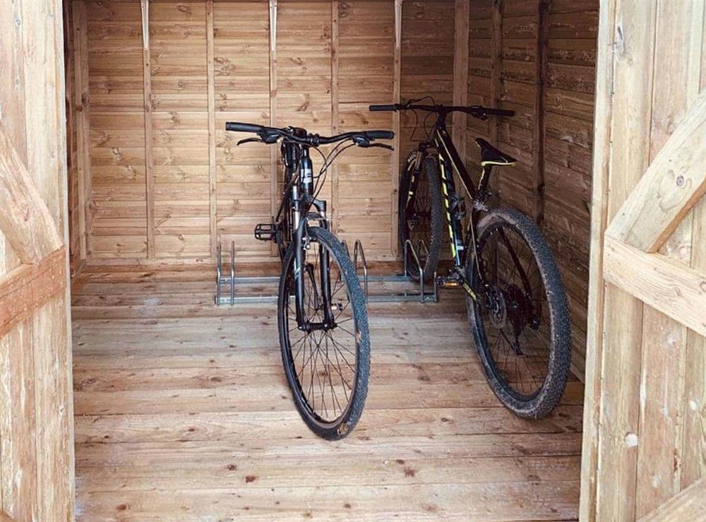 Bike store (bikes not included) at Maen Llwyd in Llanyre, near Llandrindod Wells, Powys