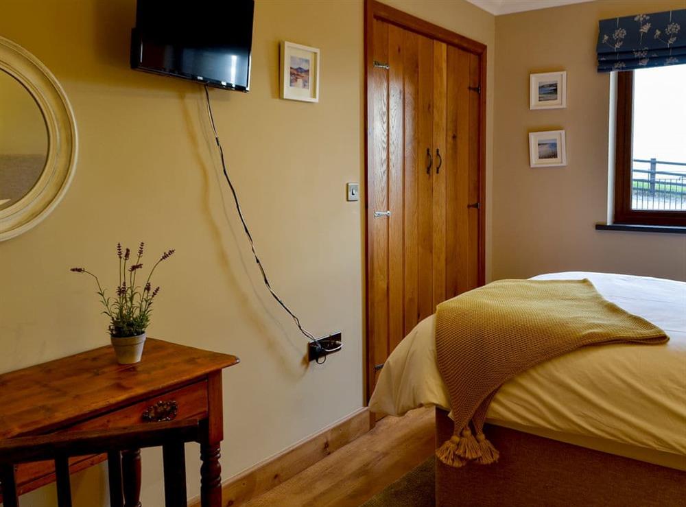 Comfortable double bedroom (photo 2) at Maes Y Bryn Farmhouse in Llansadwrn, near Llandeilo, Dyfed