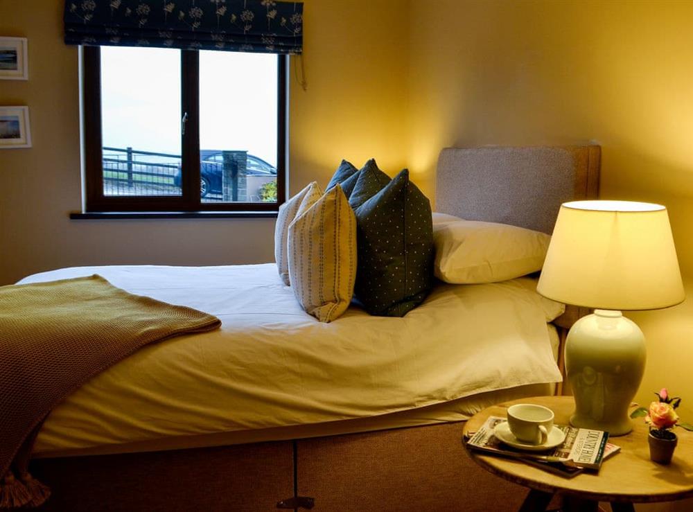 Comfortable double bedroom at Maes Y Bryn Farmhouse in Llansadwrn, near Llandeilo, Dyfed