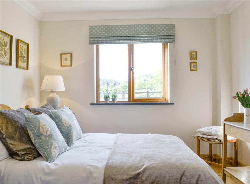 Comfortable third double bedroom at Maes Y Bryn Farmhouse in Llansadwrn, near Llandeilo, Dyfed