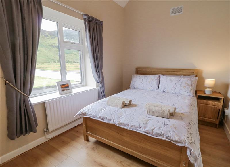 This is a bedroom at Maghera Caves Cottage, Ardara