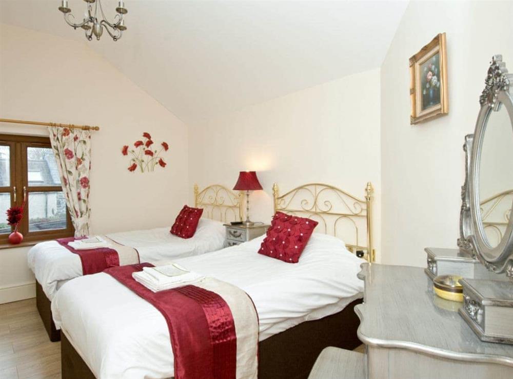 Charming twin bedroom at Magnolia Cottage in Aberaeron, Dyfed