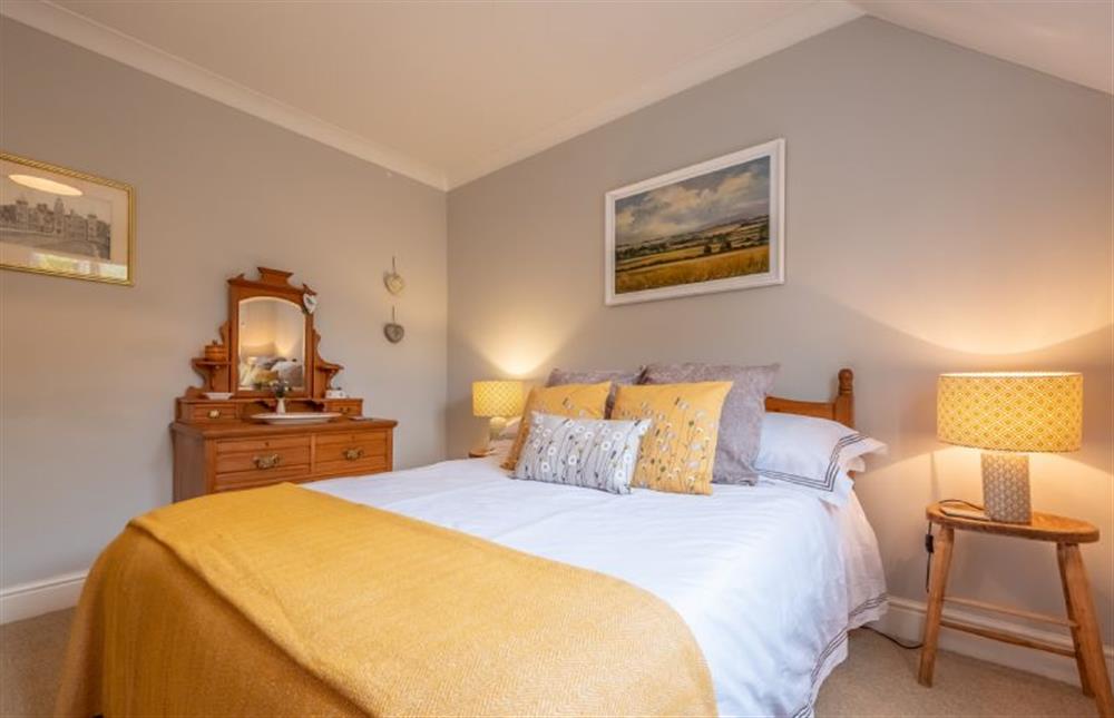 First floor: Bedroom two at Mahonia Cottage, Burnham Market near Kings Lynn