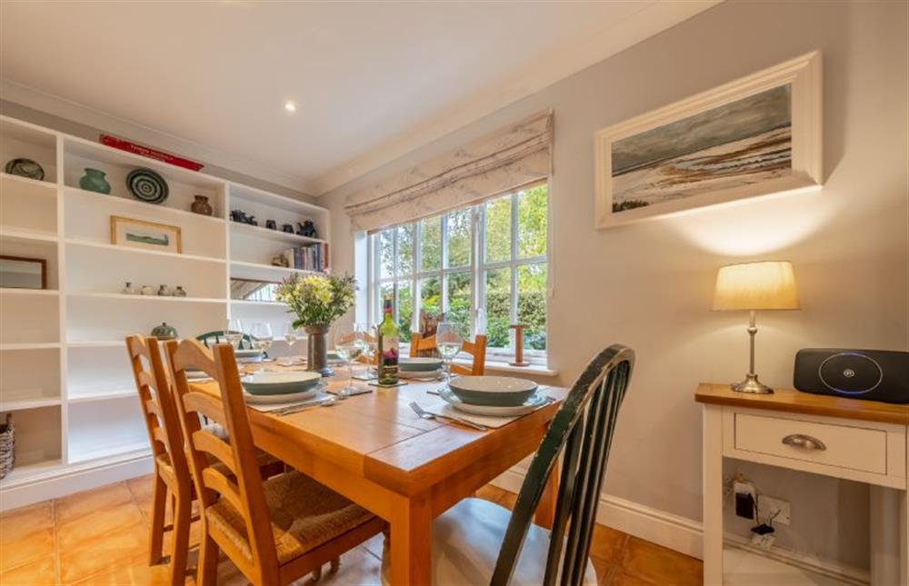Ground floor: Dining table with seating for six at Mahonia Cottage, Burnham Market near Kings Lynn