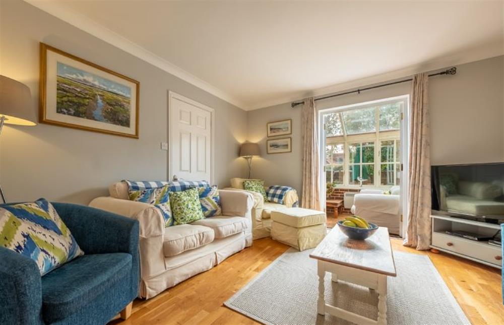 Ground floor: The sitting room extends to the conservatory at Mahonia Cottage, Burnham Market near Kings Lynn