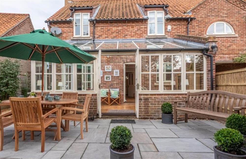 South-facing patio area perfect for dining alfresco at Mahonia Cottage, Burnham Market near Kings Lynn