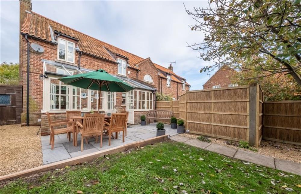 The rear garden has access from the front at Mahonia Cottage, Burnham Market near Kings Lynn