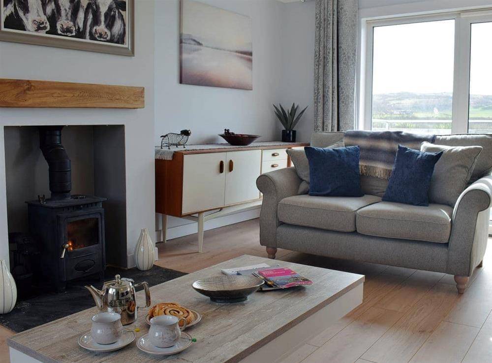 Stylish living area with cosy wood burner at Main Street in Ballantrae, near Girvan, Ayrshire