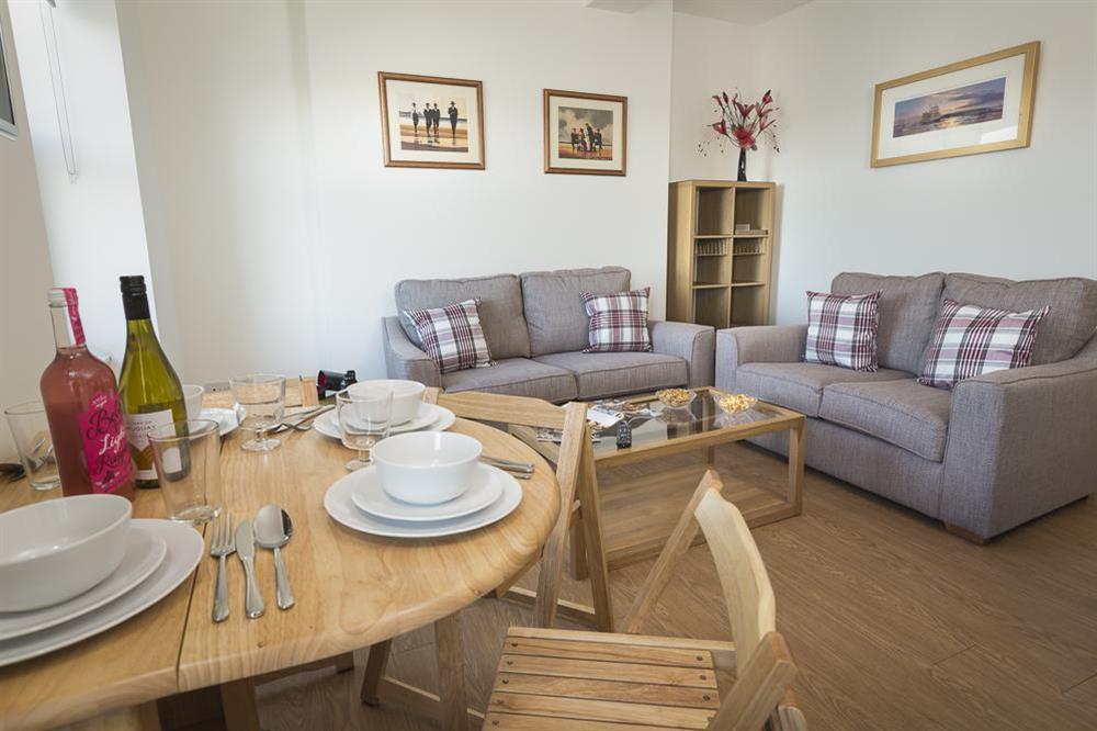Comfortable sitting/dining area at Main Top Apartment in , Salcombe