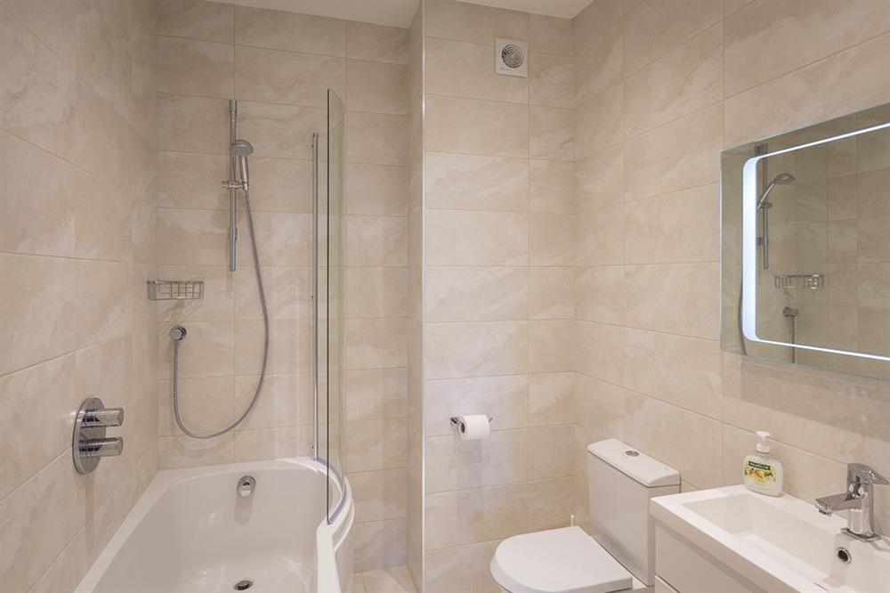 Fully tiled family bathroom at Main Top Apartment in , Salcombe