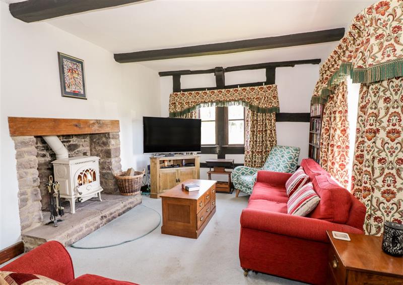 Relax in the living area at Mainstone House, Trumpet near Ledbury