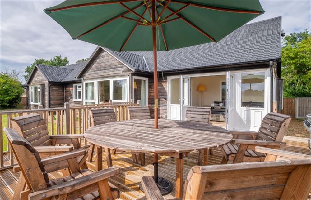 Outside: Decked terrace with views over the reserve at Majors Lodge, Watlington near Kings Lynn
