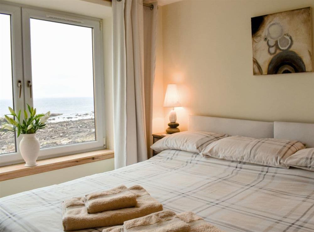 Comfortable double bedroom with sea views at Making Waves in Anstruther, Fife