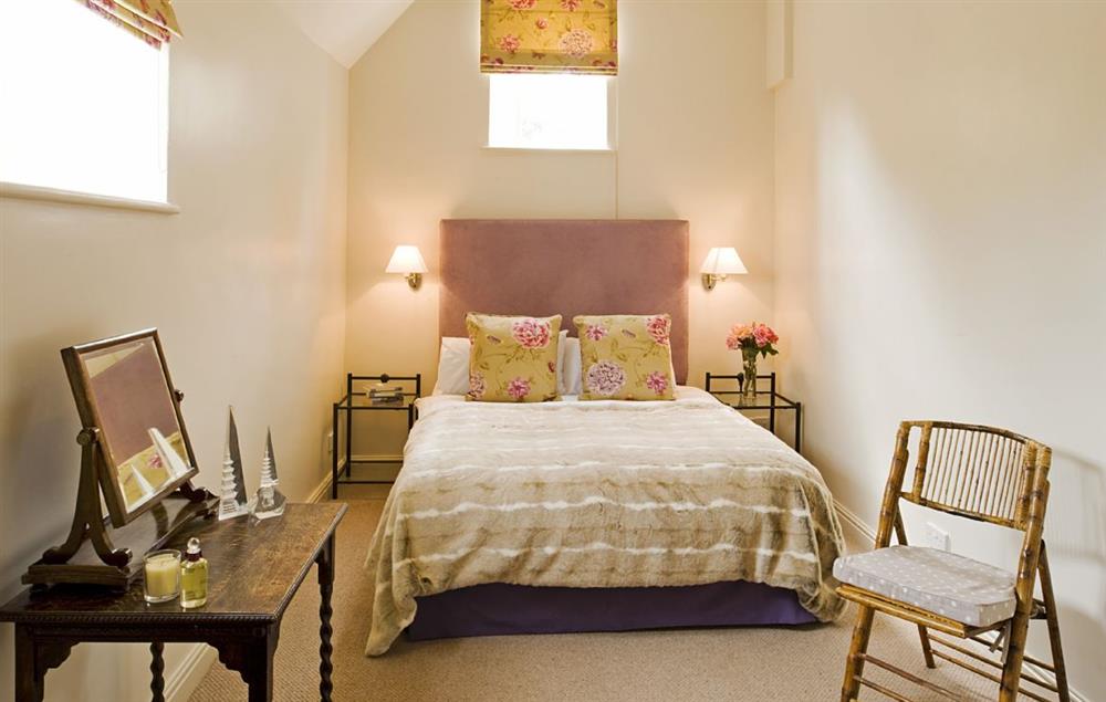 Comfortable double bedroom with plenty of natural light at Malbanc Cottage, Whitchurch