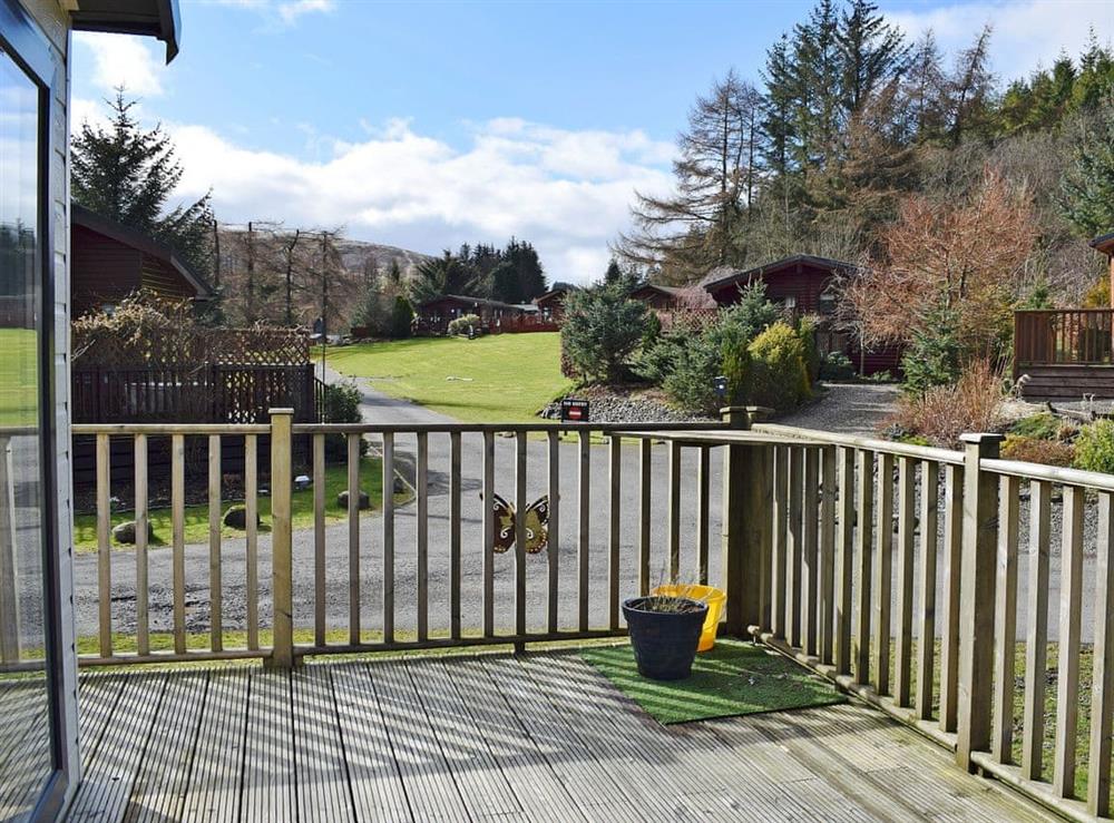 Relaxing decking area with stunning views at Malibu Lodge in Glen Devon, near Auchterarder, Clackmannanshire