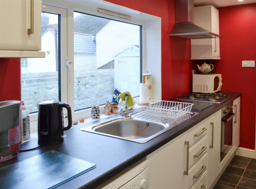 Delightful galley style kitchen at Mallams in Portland, near Weymouth, Dorset