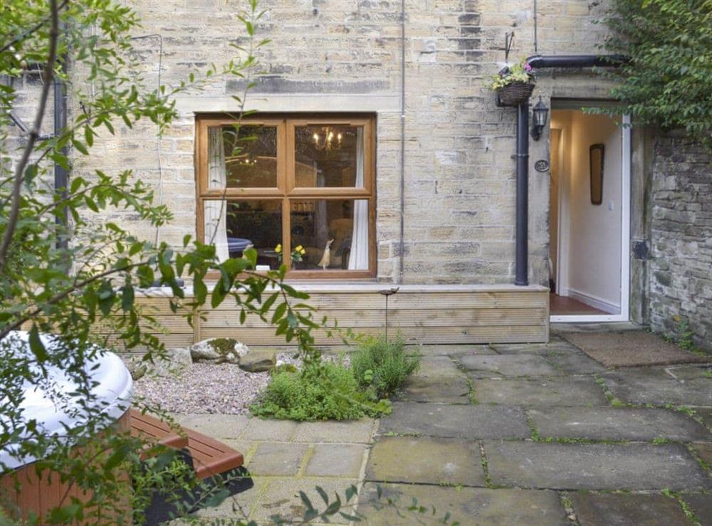 Entrance via enclosed courtyard at Mallard Cottage in Holmfirth, West Yorkshire