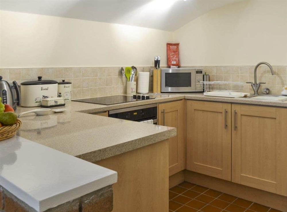 Well-equipped fitted kitchen at Mallard Cottage in Holmfirth, West Yorkshire
