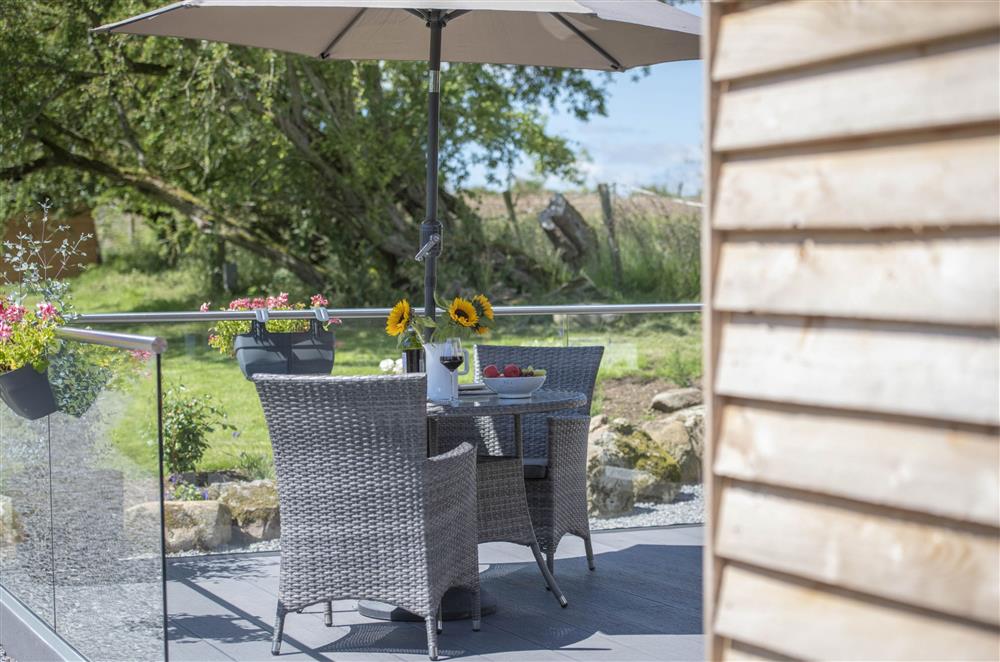 Enjoy an al fresco dinner whilst taking in the countryside views at Mallard House Lodge, Nr. Penrith