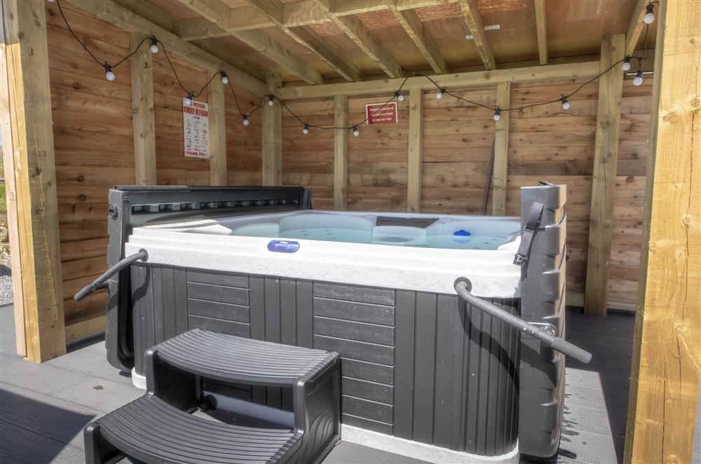 Unwind after a day of exploring in the private hot tub at Mallard House Lodge, Nr. Penrith