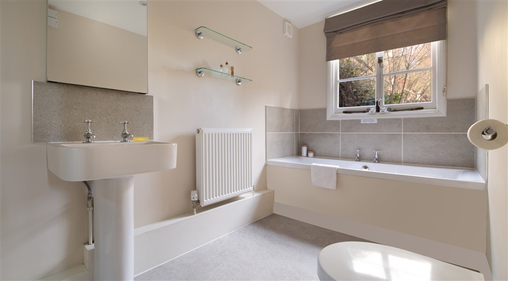 The bath in the family bathroom at Malt House in Saltash, Cornwall