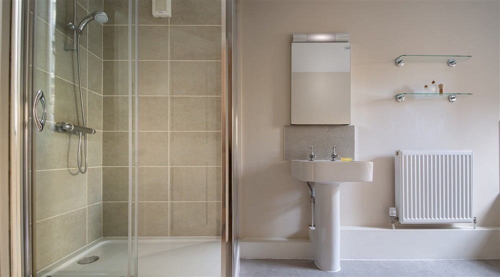 The walk-in shower in the family bathroom in Malt House, Cornwall at Malt House in Saltash, Cornwall