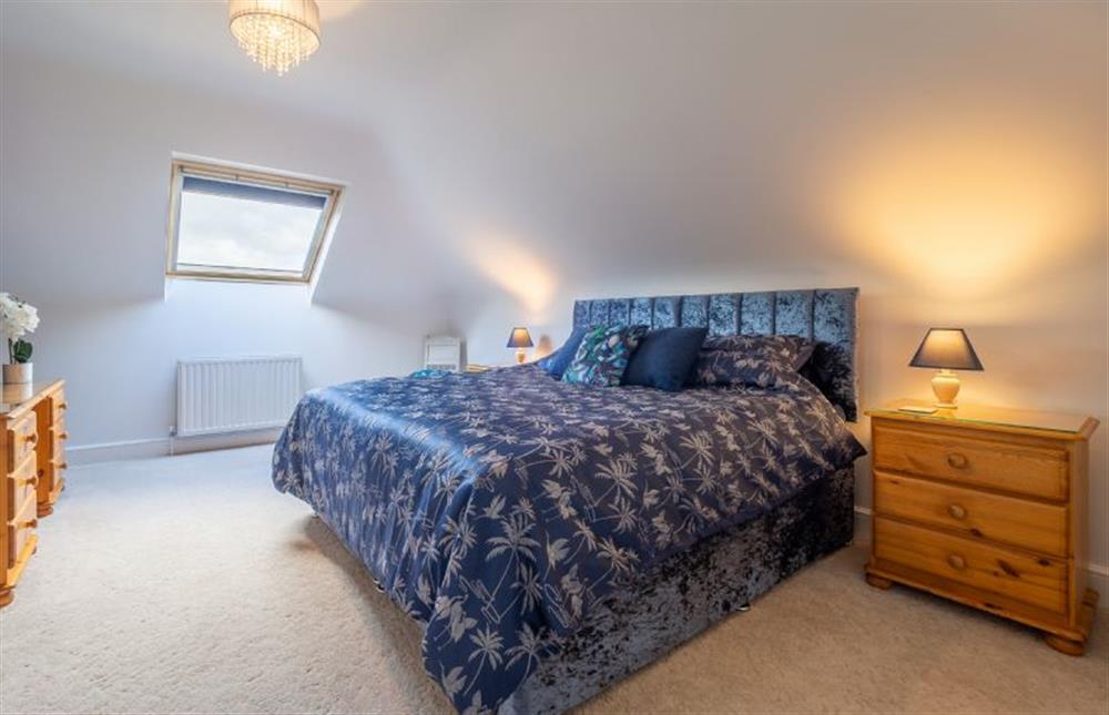 Bedroom three with a 6’ super-king size bed which can be configured as twin 3’ single beds on request